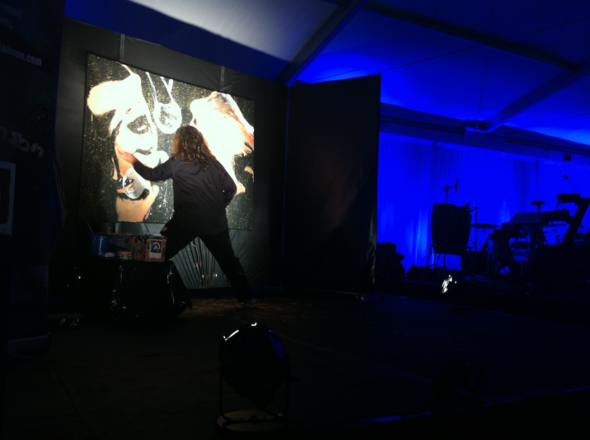 Gregory Adamson performance painting at a fundraising event